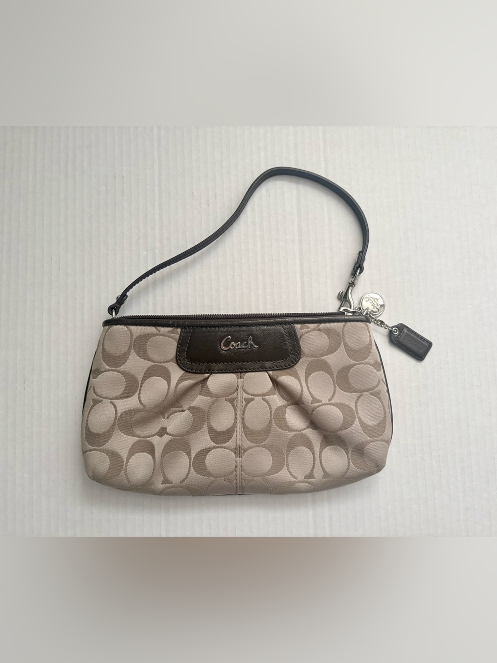 Coach Signature Vintage Beige & Brown Small Wristlet purple satin interior.